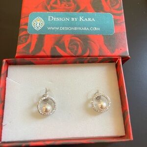 Round silver pearl-like earrings